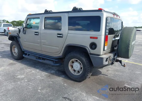 2003 Hummer H2 z USA, uszkodzony, nr VIN 5GRGN23U63H131139